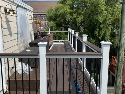 elevated composite deck with black metal railings