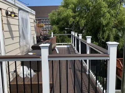 composite deck with black balusters and white posts