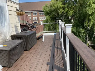 composite deck with storage bench and grill cover