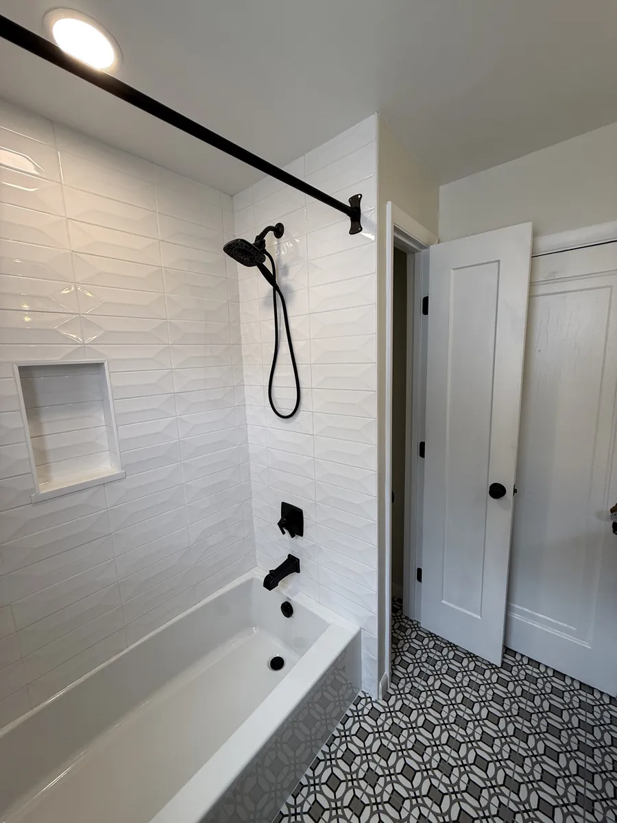 Bathroom tile and fixture detail
