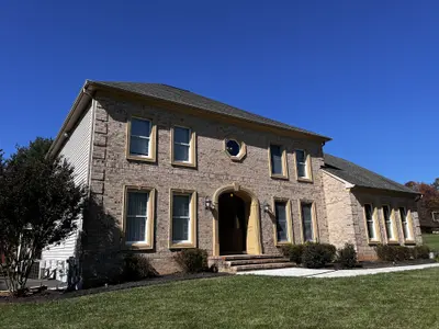 Brick two-story home angled exterior view