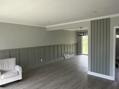 Open-concept living and dining remodel with board-and-batten wainscoting